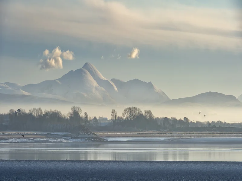 Solway Firth Scotland looking across the Solway Firth to The Snow Covered Lake District
